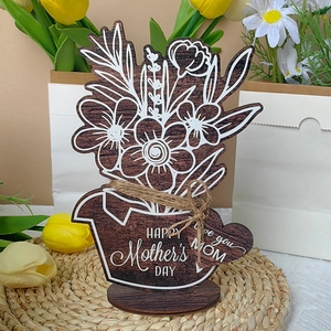 Detail of wooden Mother's Day flower pot decor with Happy Mother's Day and Love You Mom text
