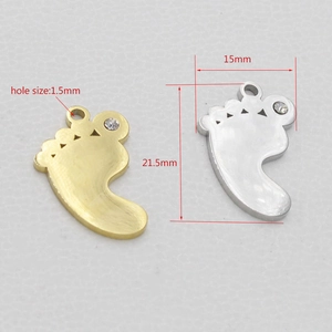 Detailed size specifications for baby feet pendant in gold and silver finish with rhinestones