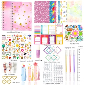 Pink galaxy DIY journal set with scrapbook stickers, pens, and decorative stationery