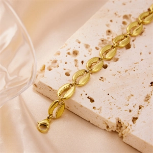 Elegant 18K gold-plated titanium steel bracelet featuring detailed conch shell charms