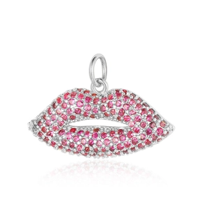 Macro view of a silver-tone lip-shaped pendant set with vibrant pink cubic zirconia stones