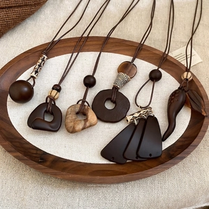 Set of 6 bohemian resin wood geometric pendant necklaces with ethnic tassel design