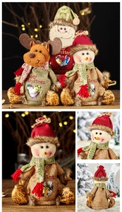 Detailed view of burlap Christmas candy bags with snowman, elk, and Santa Claus dolls