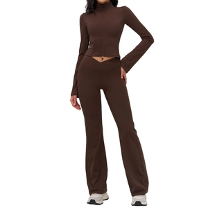 Deep brown yoga set featuring a stand collar zip jacket and flared leggings with side pockets