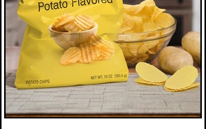Close-up of potato chips in a glass bowl with yellow snack bag on a textured mat