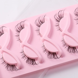 Five pairs of cat-eye false eyelashes with clear bands for a natural winged lifting effect