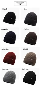 Close-up of ribbed knit beanies in eight colors with FEKS square logo patch