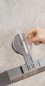 Close-up of suction cup base for wall-mounted soap dish with strong adhesive pad