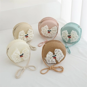 Straw bags for girls featuring lace bows and cherry charms in five pastel colors
