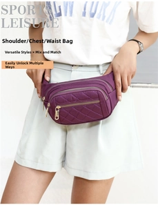 Detail of purple quilted nylon waist bag with three golden zippers and diamond stitching