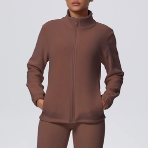 Detail of coffee brown zip-up high-neck sports jacket with side pockets and elastic cuffs