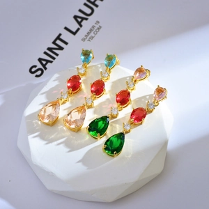 Luxurious gold-tone drop earrings featuring colorful crystal zircon in teardrop and oval shapes