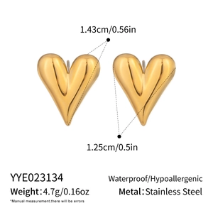 Macro detail of gold-plated stainless steel heart studs showing dimensions and features