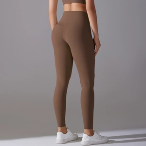 Rear view of brown high-waisted yoga leggings showing butt-lifting contour and seamless design