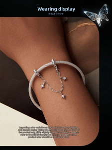Close-up of S925 silver mesh bracelet with star charms and sparkling zircon inlay