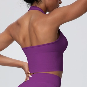 Close-up of purple high-impact sports bra featuring racerback design and ribbed hem