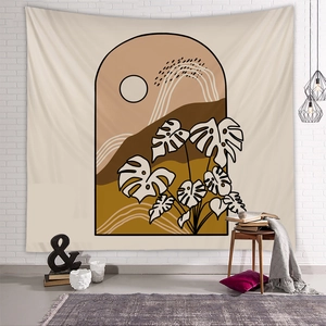 Detail of Nordic tapestry featuring abstract mountains and monstera leaves on a white brick wall