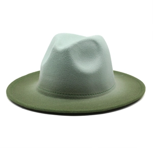 Detailed texture of thick felt fedora hat featuring unique teal to olive green gradient