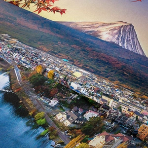 Detailed close-up of Mount Fuji tapestry featuring autumn leaves and lake landscape
