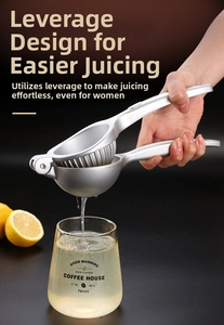 Zinc alloy manual lemon squeezer with lever action pressing juice into a glass cup