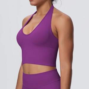 Detail of purple halter neck sports bra showing ribbed seamless texture and side fit