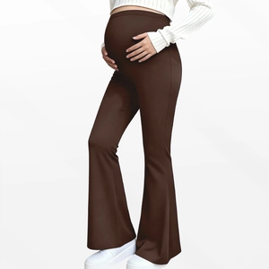 Detail view of high-waisted maternity yoga flare pants with elastic belly support