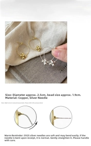 Detailed view of minimalist geometric hoop earrings in gold and silver finish