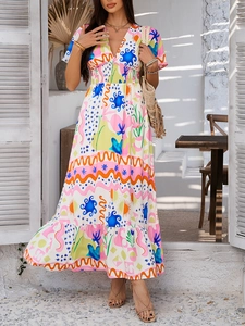Detail of V-neck maxi dress with vibrant floral geometric print and ruffled hemline