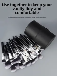 Detail of 40-piece makeup brush set with black leather storage case and silver ferrules