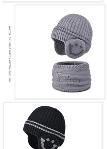 Detail of children's winter knitted hat and scarf set with fleece lining and smiley patch