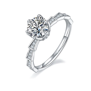 925 silver moissanite ring with round brilliant cut center stone and geometric band