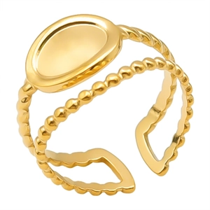 Close-up of golden double-layer ring featuring a smooth oval face and twisted band