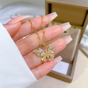 Chic butterfly pendant necklace with zircon stones in gold titanium steel finish