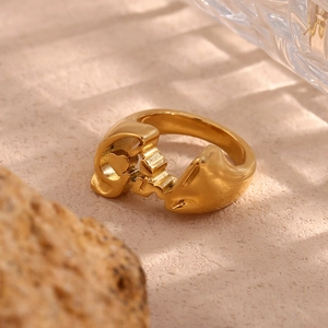 Macro shot of 18K gold plated stainless steel ring with sculptural heart design