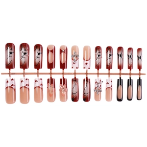 Burgundy and milk pattern press-on nails with 3D metal cross and sparkling rhinestones