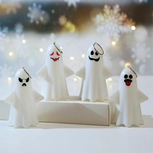 Set of four white Halloween ghost LED hanging lanterns with various cute facial expressions