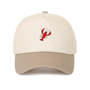 Close-up of red lobster embroidery on two-tone cotton baseball cap with khaki brim