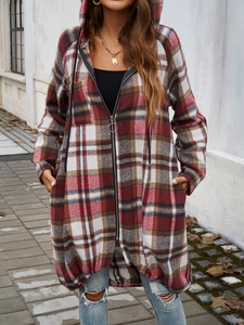 Detail of red, white, and blue plaid pattern on casual loose zip-up hooded jacket