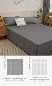 Close-up of high-density gray washed cotton sheet with thick texture and anti-pilling fabric