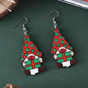 Festive Christmas gnome wooden earrings featuring red and green hats with gift box patterns