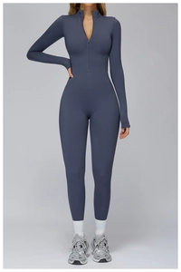 Close-up of slate blue thermal yoga bodysuit featuring half-zip collar and slim fit