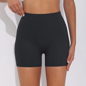 Close-up of black high-waisted yoga shorts with seamless texture and elastic fabric