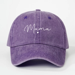 Detailed embroidery of white Mama text and small heart on purple washed baseball cap