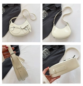 Vues détaillées du sac Hobo blanc avec fermetures argentées et texture grainée