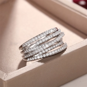Close-up of hip-hop style multilayer silver ring with cubic zirconia micro-pave setting