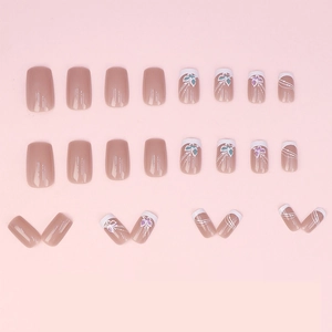 French butterfly press-on nails set in nude pink and white with floral art designs
