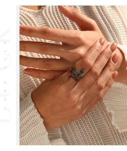 Detailed side view of S925 silver snake ring with colorful gradient crystal pavé setting