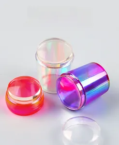 Detail of colorful French nail art stamper with translucent shell and soft silicone head