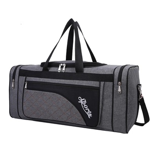 Gray Oxford travel bag with black handles, adjustable strap and white Sports lettering