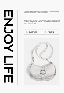 Close-up of silver crescent moon shoulder bag with polished metal buckle and adjustable strap